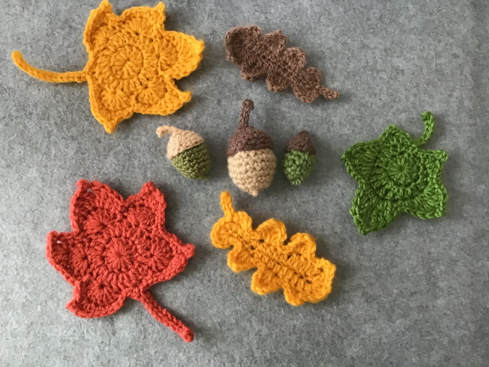 Crocheted autumn leaves and acorns